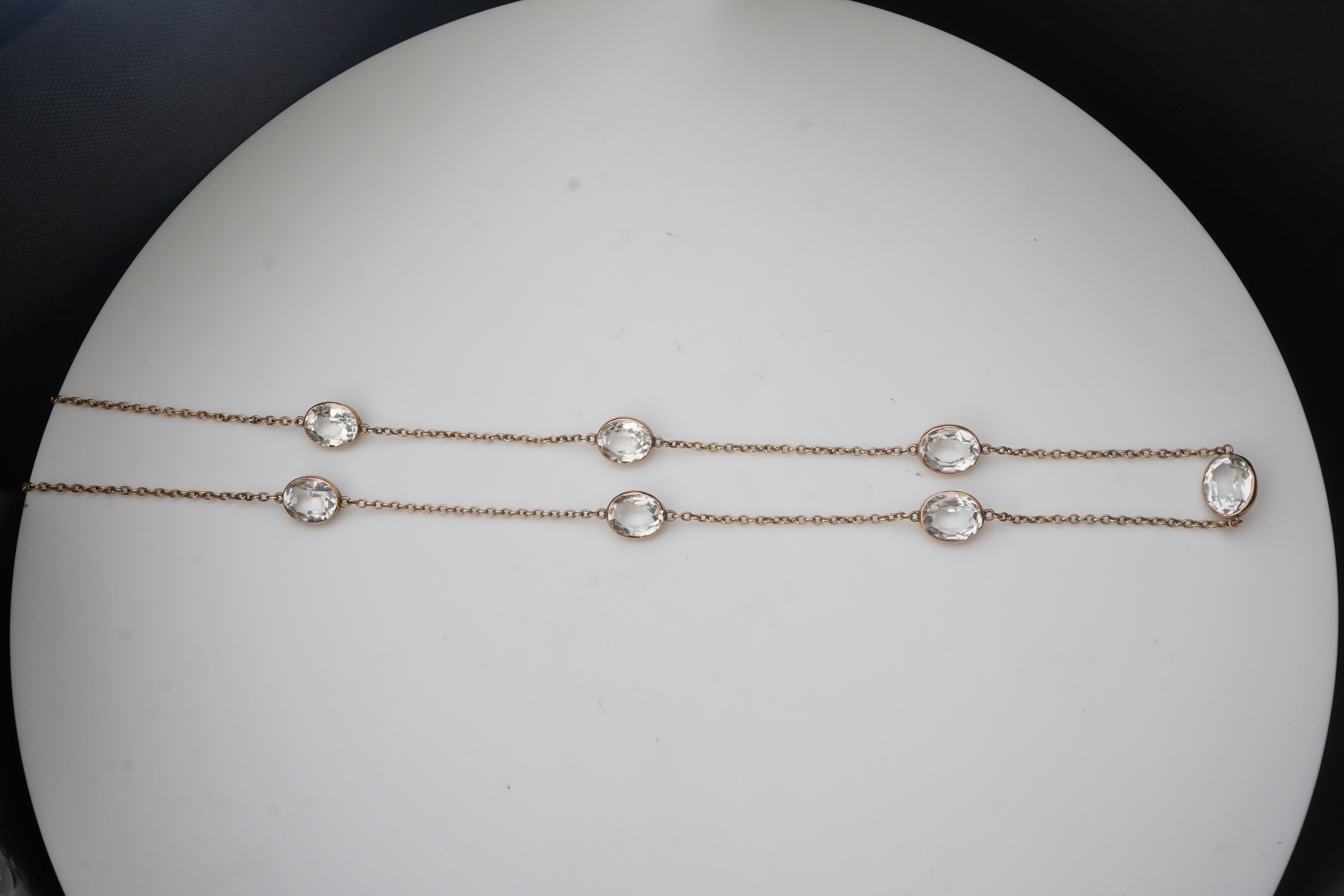 A rock crystal long chain necklace, early 20th century